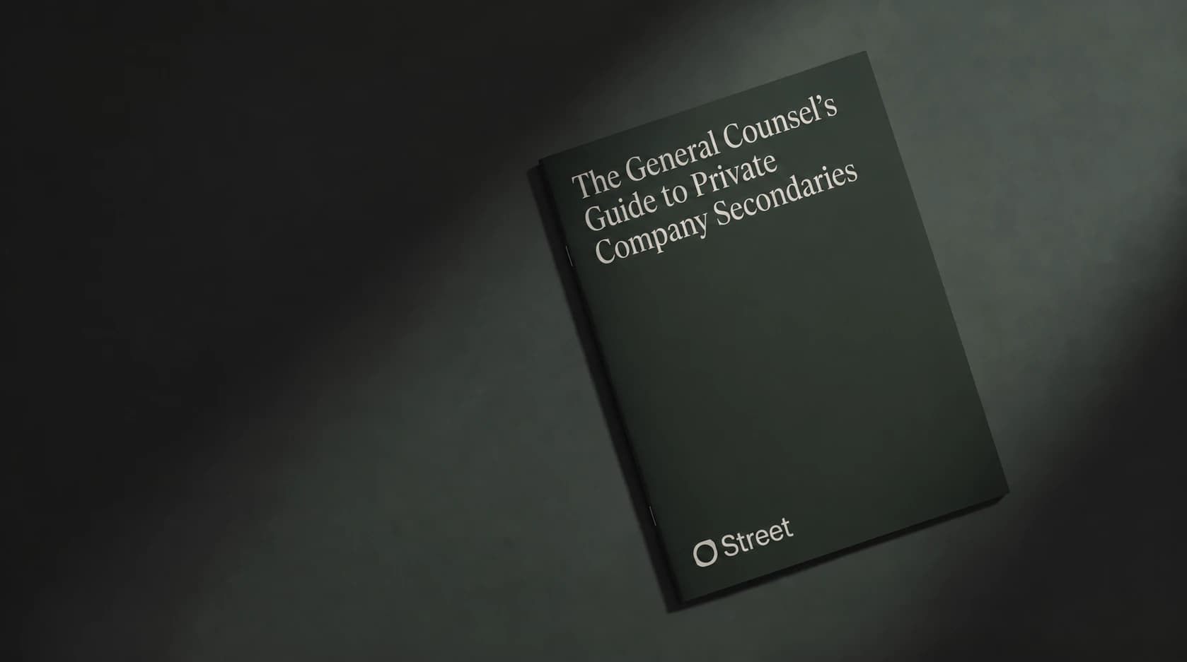 A thin Street legal guide laid flat, with the Street symbol and wordmark on its cover